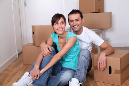 Professional packers handling belongings