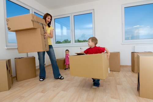 Packing and loading belongings into a moving truck in Pimlico
