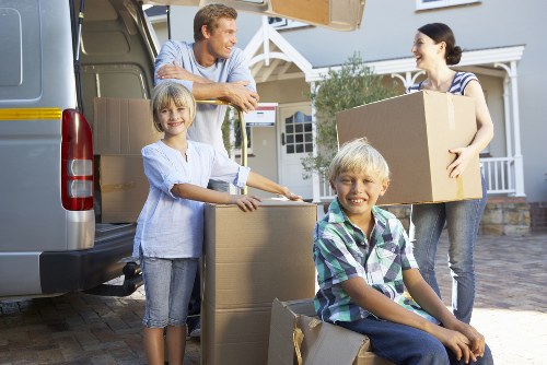 Professional movers handling furniture