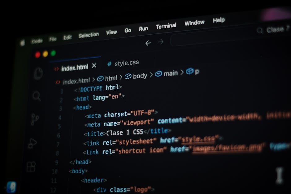 A close-up photograph of a computer screen displaying lines of HTML code in a code editor. The code includes tags for images, such as <img src=